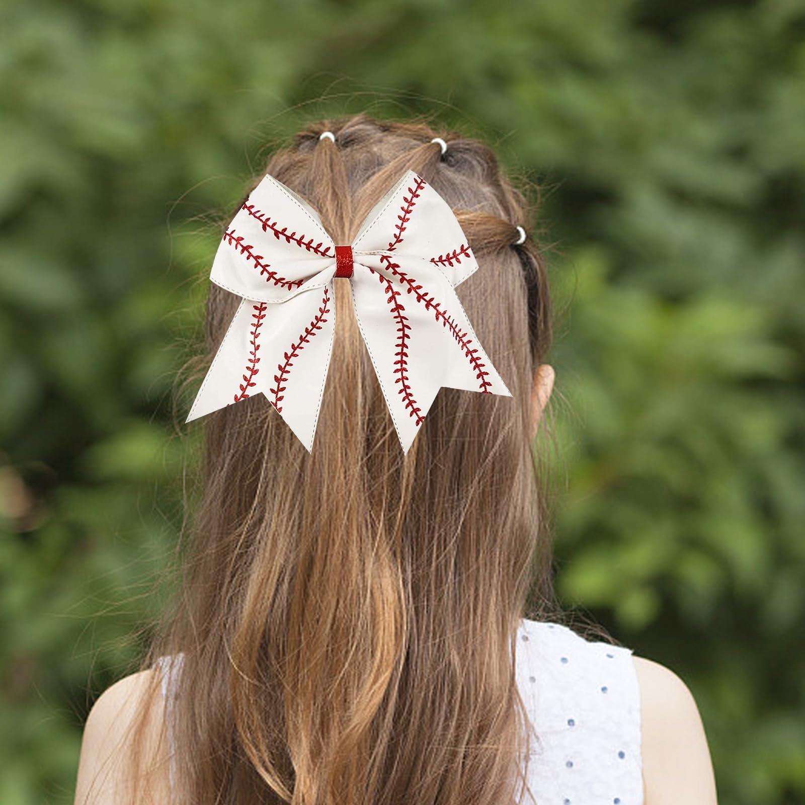 JRAIYBZ bow worn in a ponytail demonstrating secure hold during play