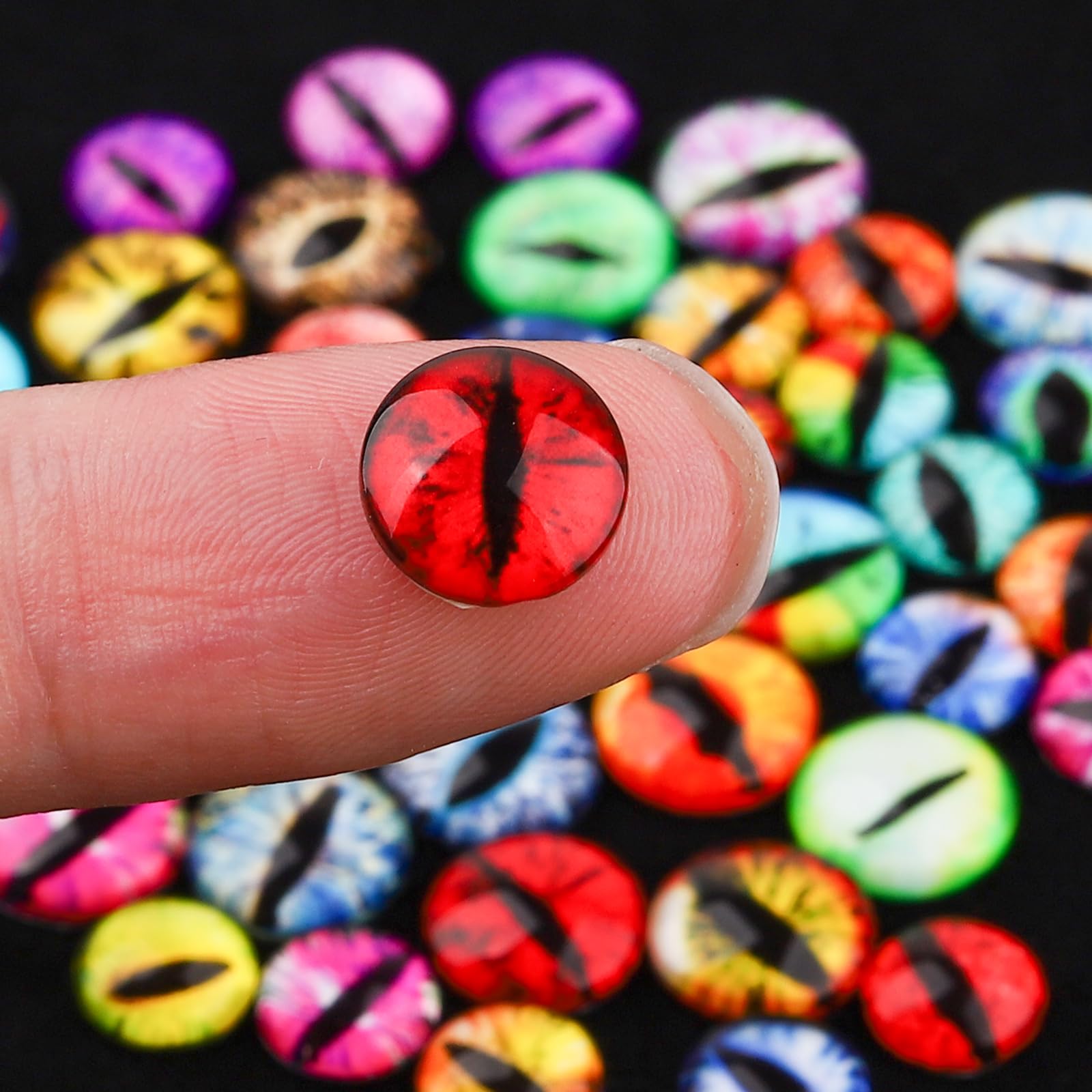 Jremg eyeball charms applied on nail tip demonstrating finished look