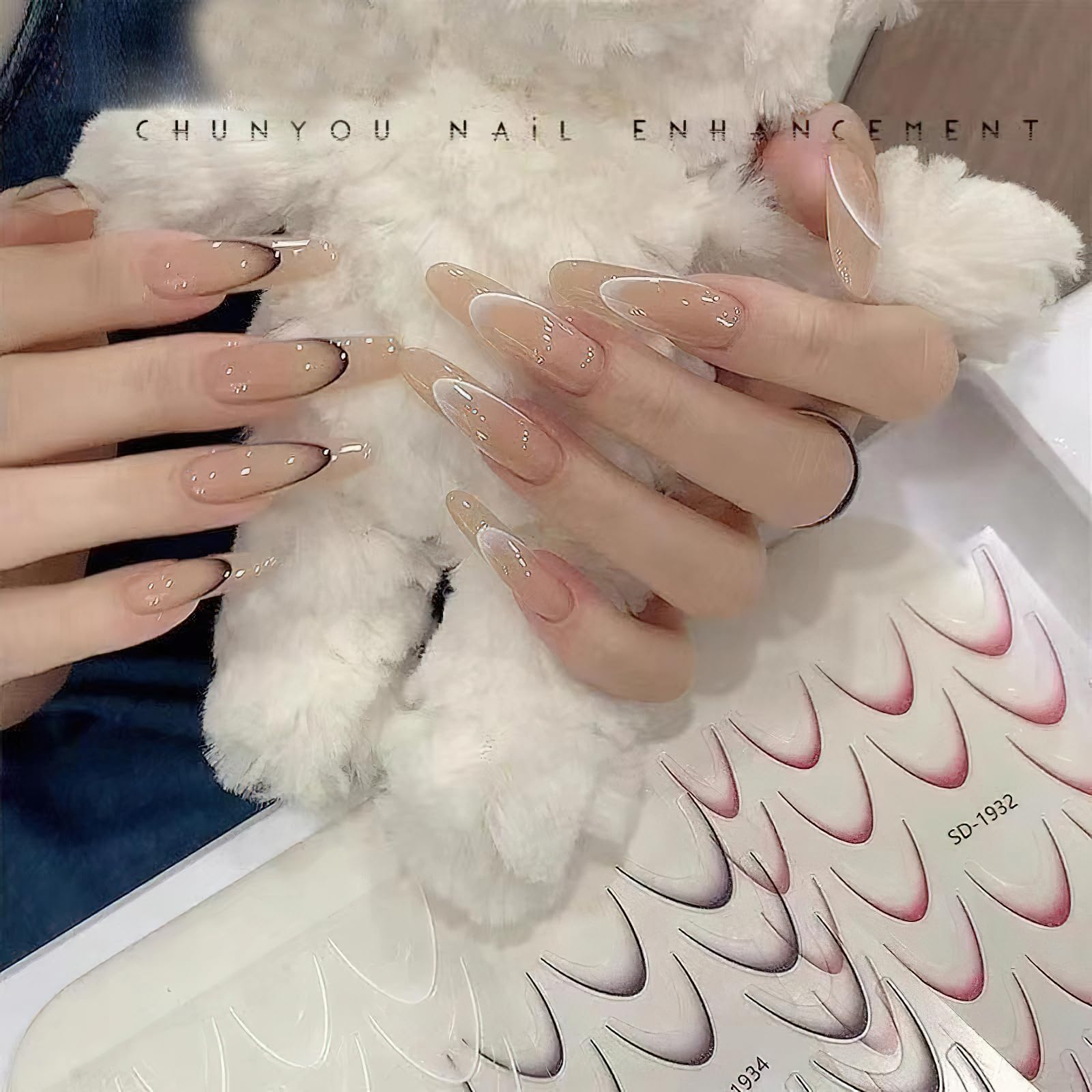 Jremg in use placing decal on nail with tweezers, precise application benefit