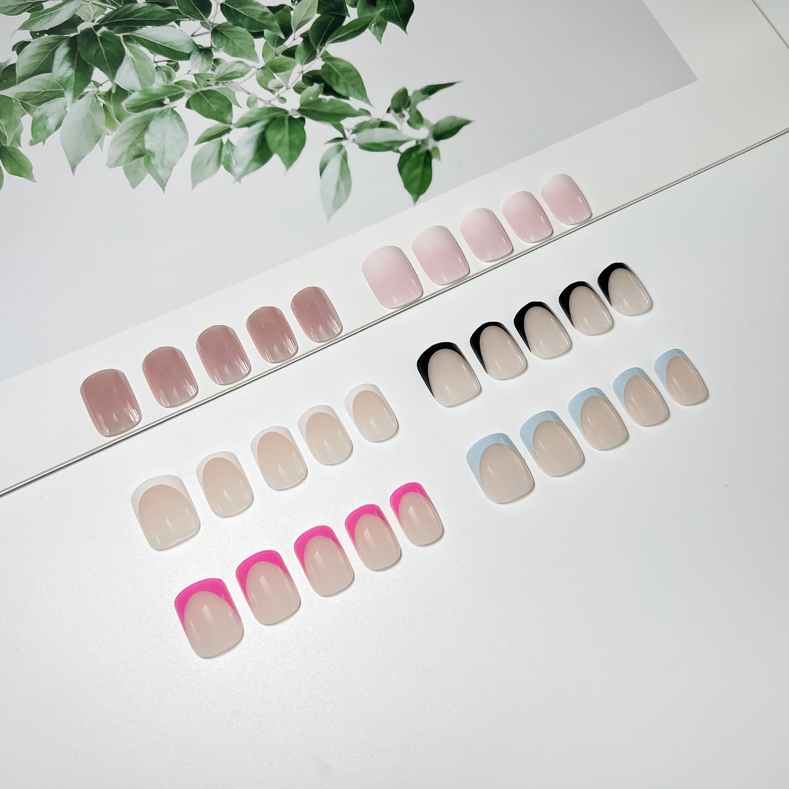Jsiallye lifestyle image of woman wearing short French nails confidently