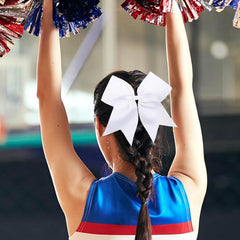 JUCCPUL cheer bow attached to a ponytail demonstrating stable hold in motion