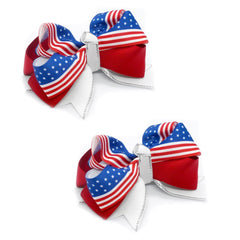JUCCPUL bow in parade setting clipped to hair showing holiday use benefit: patriotic flair