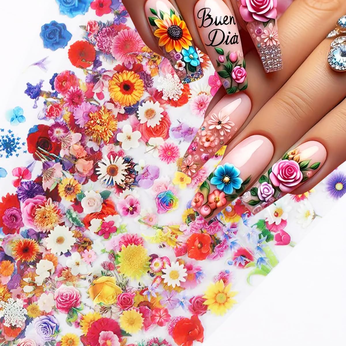 juggssa finished spring manicure on hands showing floral foils sealed with glossy top coat