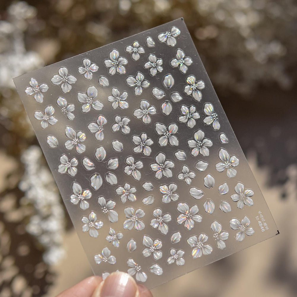 juggssa decals on acrylic gel nails illustrating strong adhesion and glossy finish