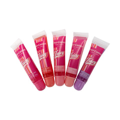 Juicy Couture size comparison on hand showing compact tubes that fit in purses
