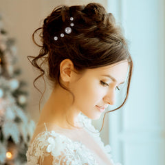 juinte styled in bridal updo demonstrating elegant hold and visual accent