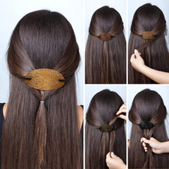 juinte hand holding barrette for scale showing size fit for most heads