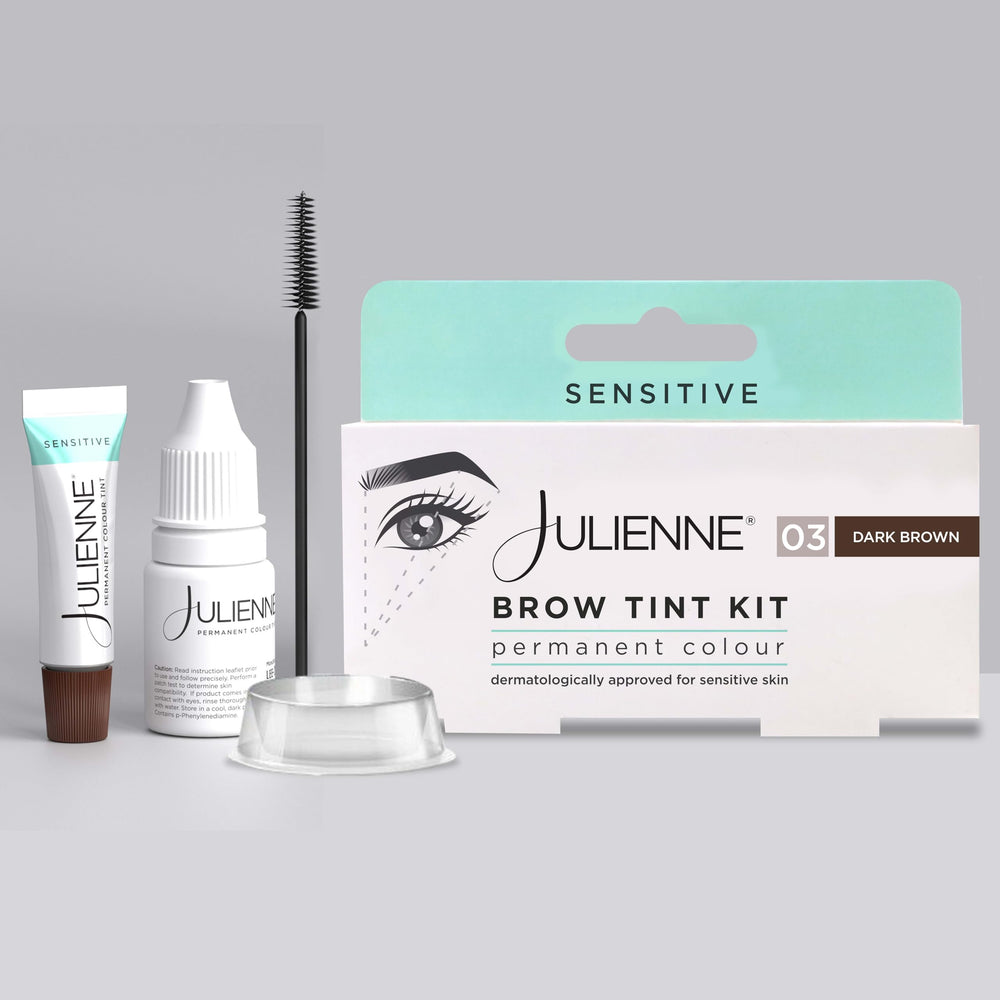 Julienne tint bottle close-up showing Dark Brown pigment and precise dosing