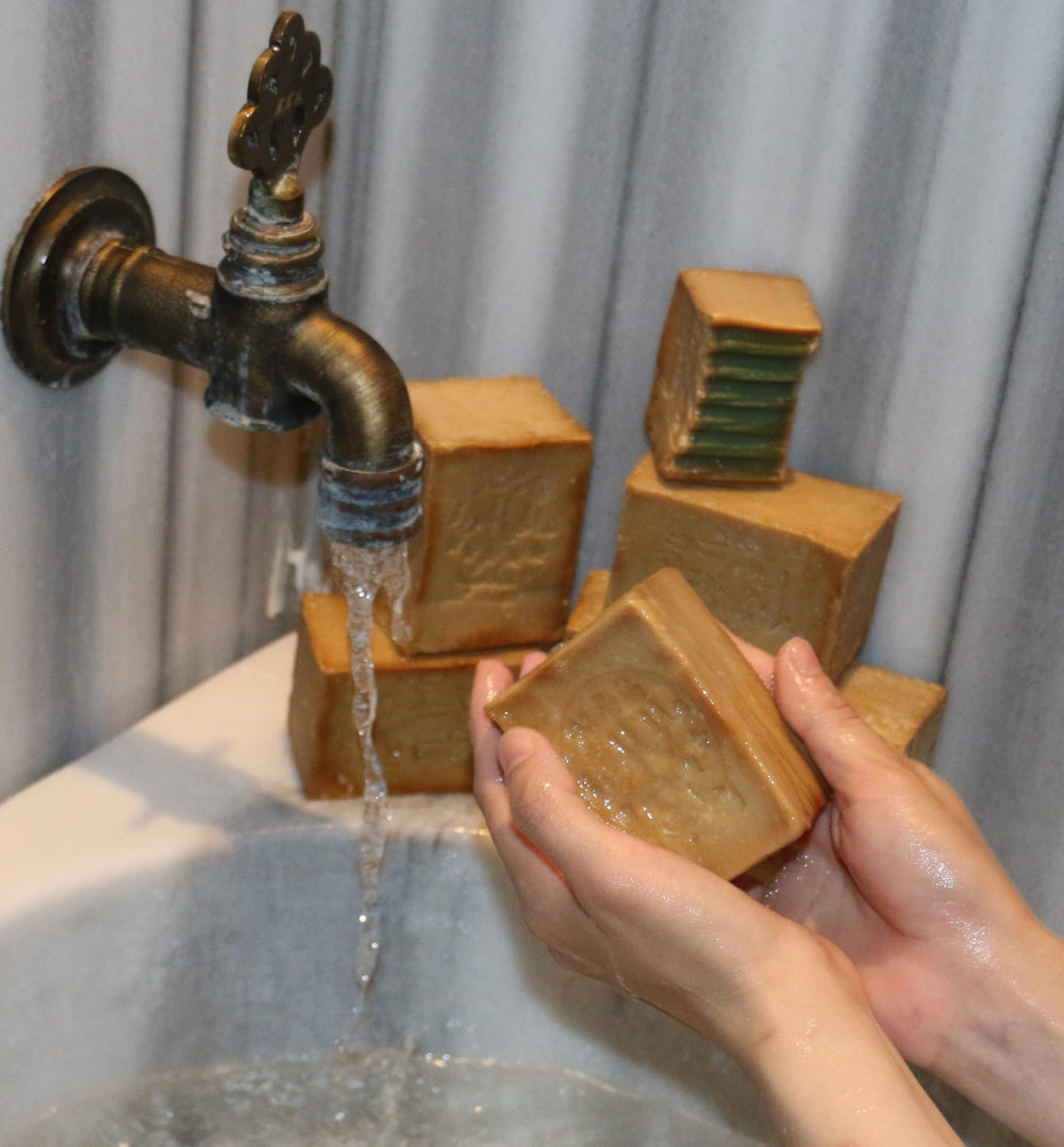 JUSIZA wrapped bars presented as gift-ready natural soap