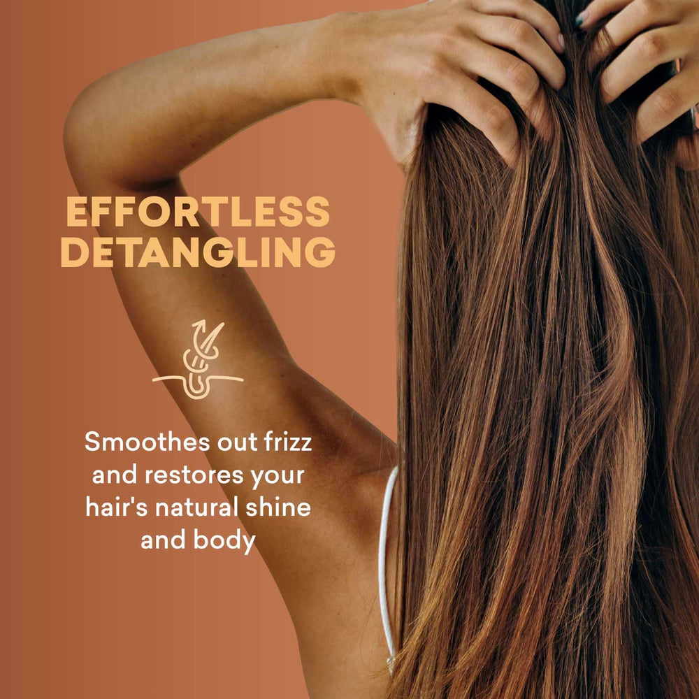 Applying Just Nutritive on wet hair to detangle and reduce breakage while styling
