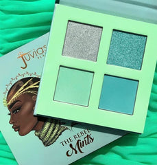 Juvia's Place palette held in hand displaying compact size for travel convenience benefit