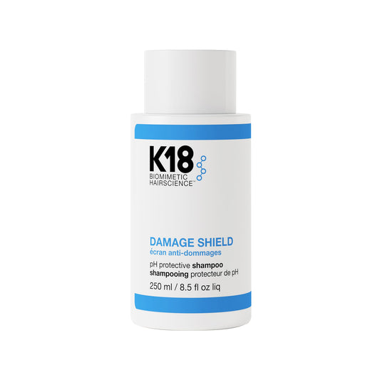 K18 front bottle showing brand and protective shampoo benefits