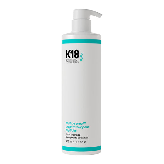 K18 front bottle showing clean label and product purpose, clarifying benefit