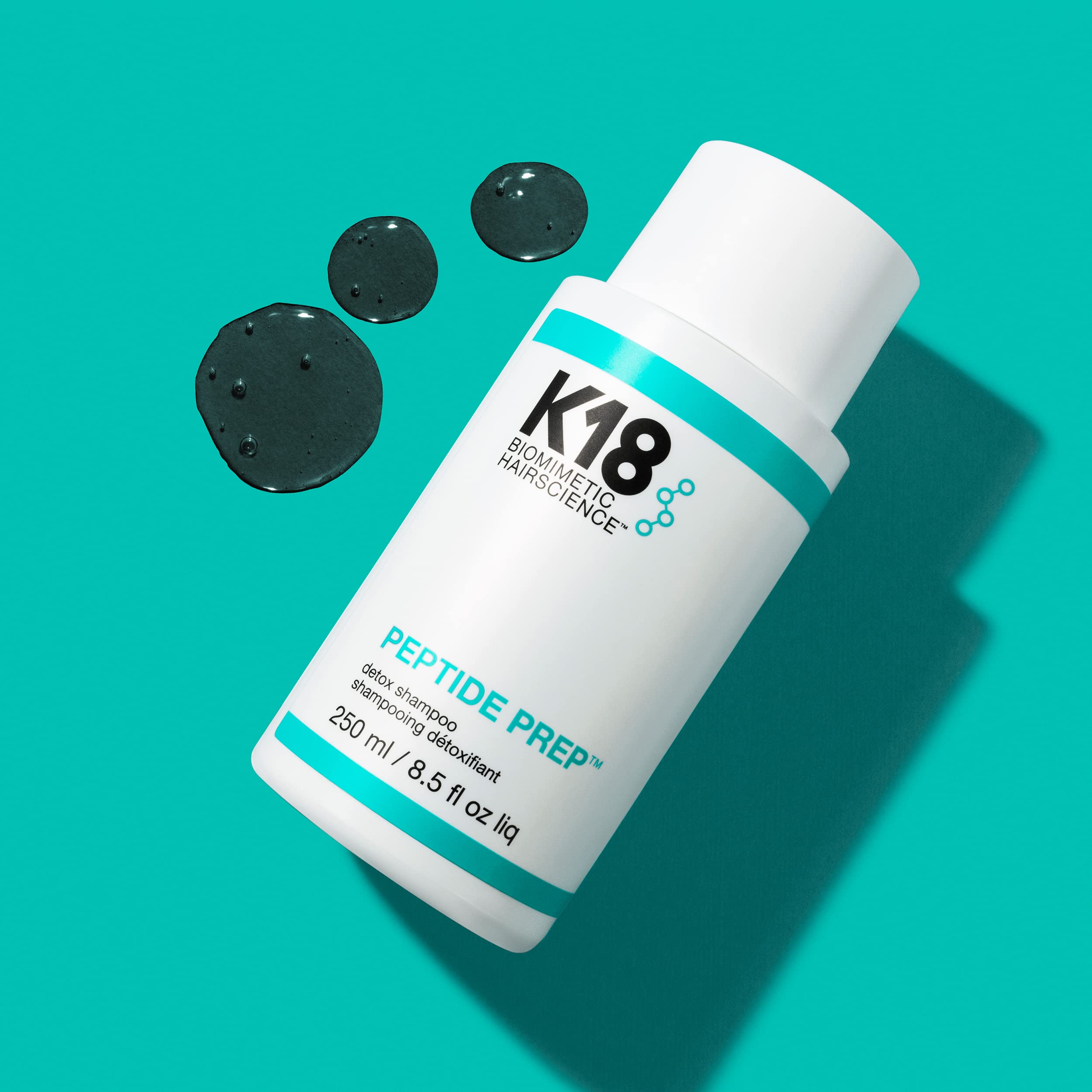 K18 shampoo lather on scalp demonstrating build-up removal and gentle cleanse benefit