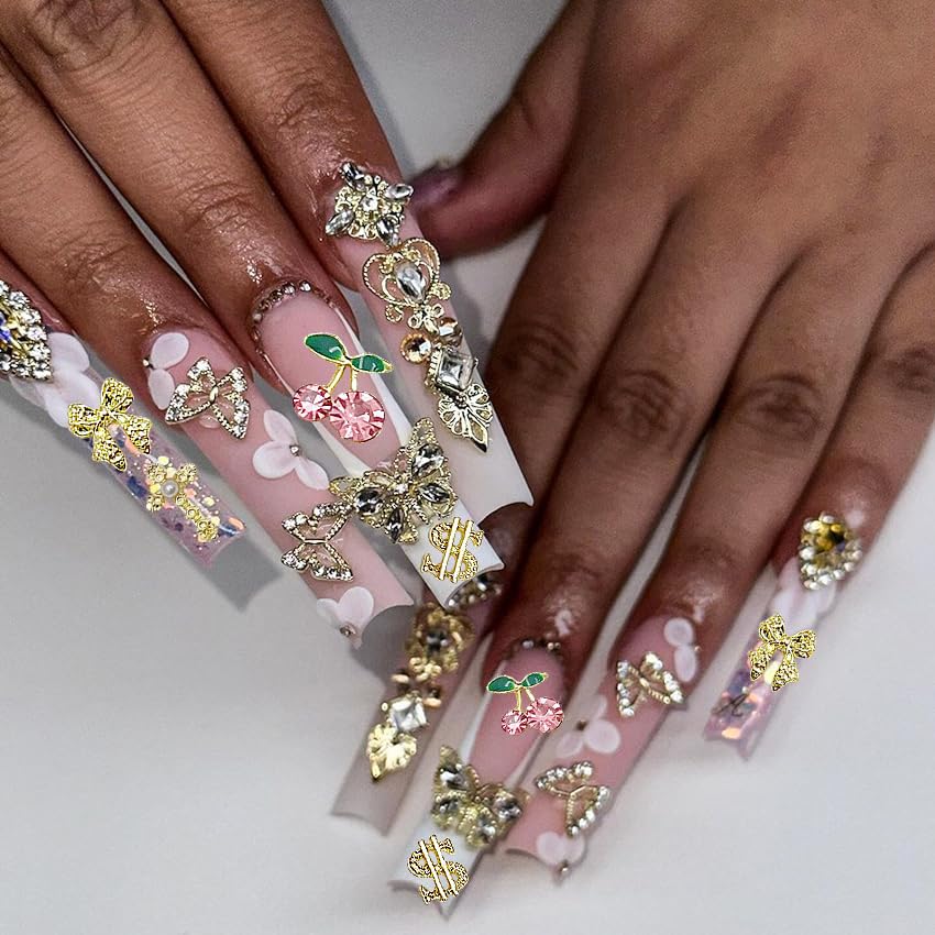 KACHIMOO charms beside a coin to show scale and size suitability for nail tips