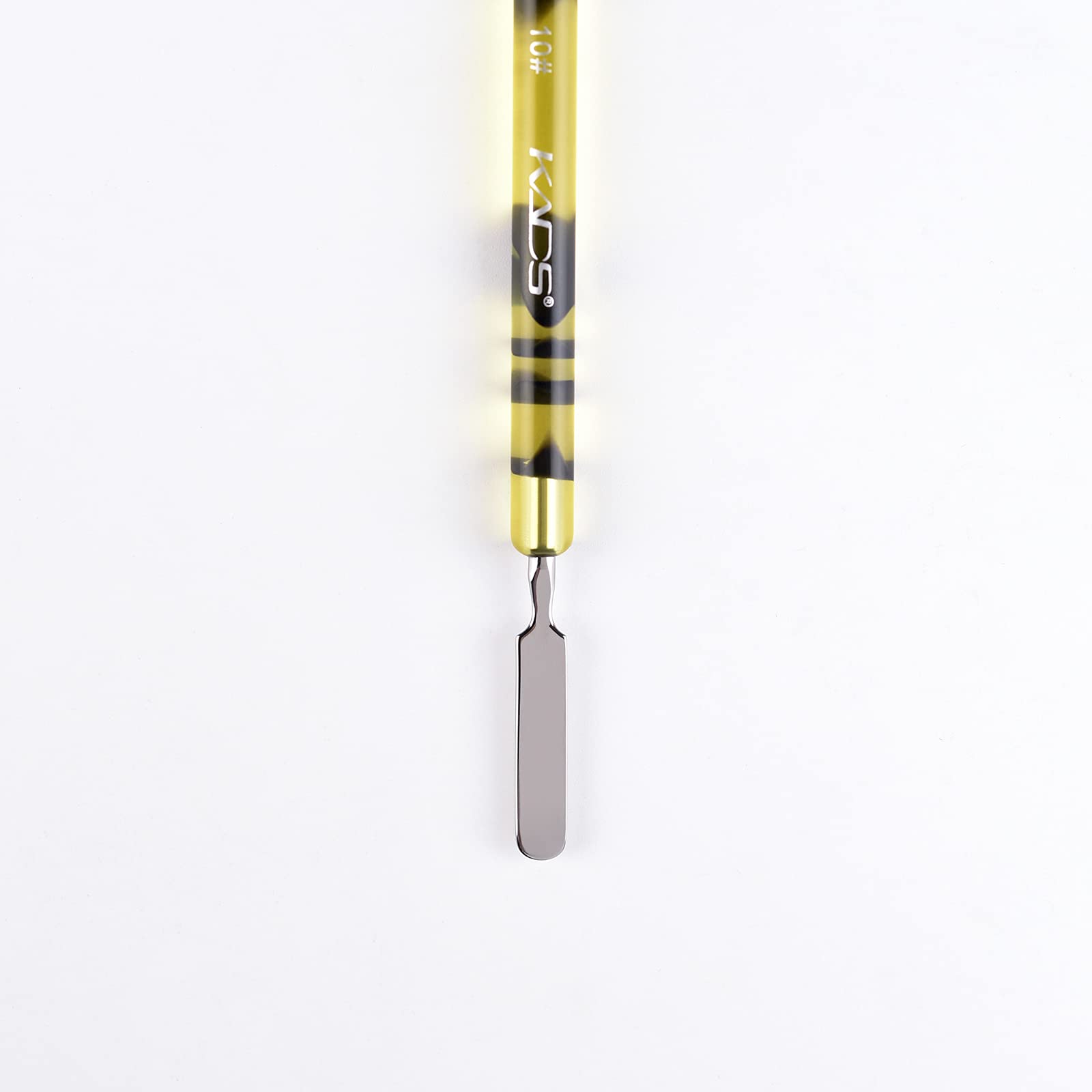 KADS Kolinsky brush beside ruler showing compact size and portability benefit