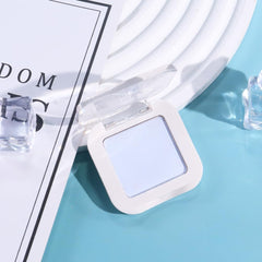 Kaely compact open with mirror illustrating travel-ready convenience and protection