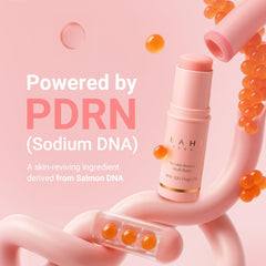 KAHI applying balm to lips for instant hydration and natural sheen benefit