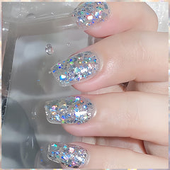 KAHSOSE on nail swatch over color showing prismatic effect and glossy finish benefit