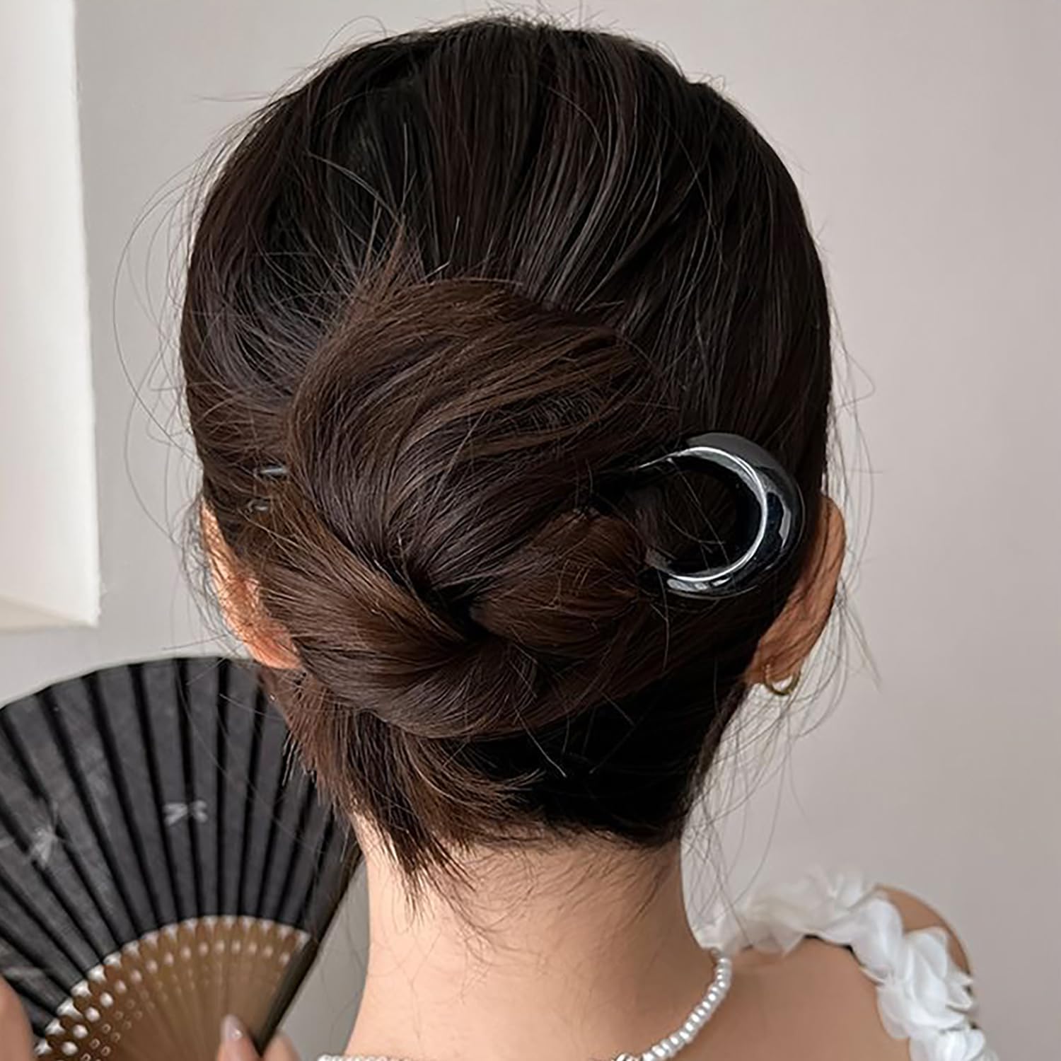KAICCOSO green mermaid pin securing a bun for reliable everyday styling