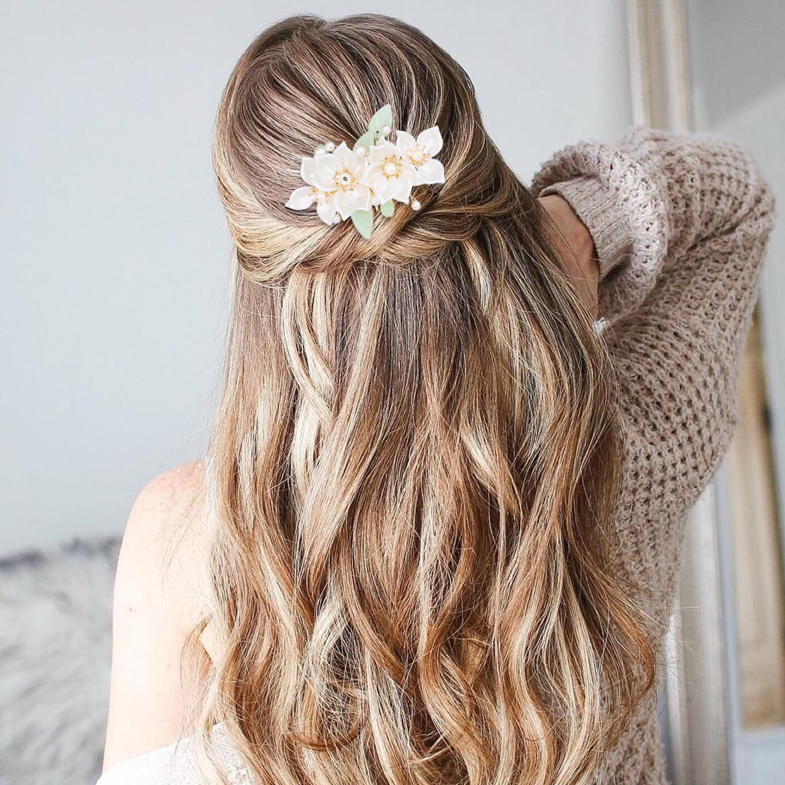 KALIONE hairpins worn in a bridal updo adding romantic accents