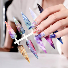 Kalolary finished galaxy nail lifestyle photo demonstrating striking wearable sparkle