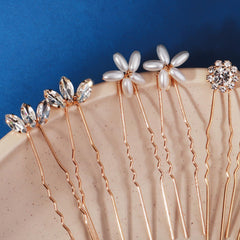KALOLIA bride wearing hair pins with veil, polished bridal appearance in photos