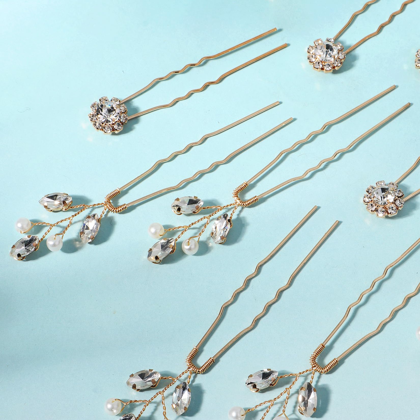 KALOLIA pins next to a ruler showing size and scale for styling planning