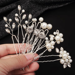 KALOLIA hair pins placed in an elegant updo adding refined shine
