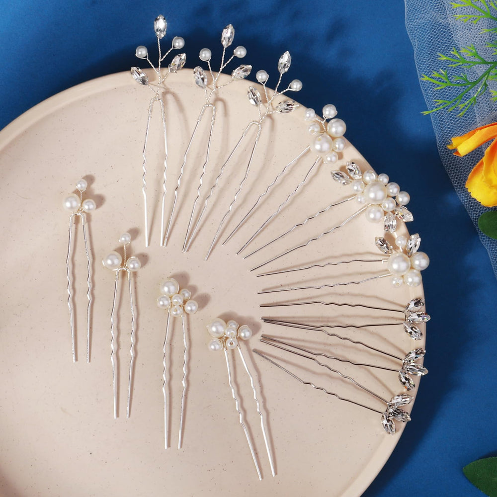 KALOLIA pins held in hand to show size and lightweight portability