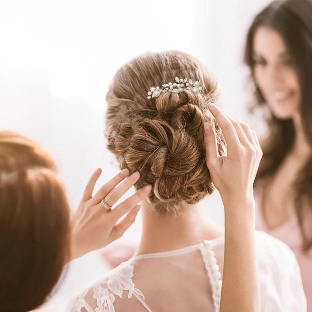 KALOLIA hair pins held in hand to show scale and lightweight comfort
