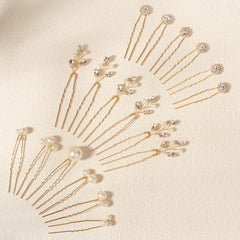 KALOLIA pins beside fingers for scale demonstrating compact size and easy placement