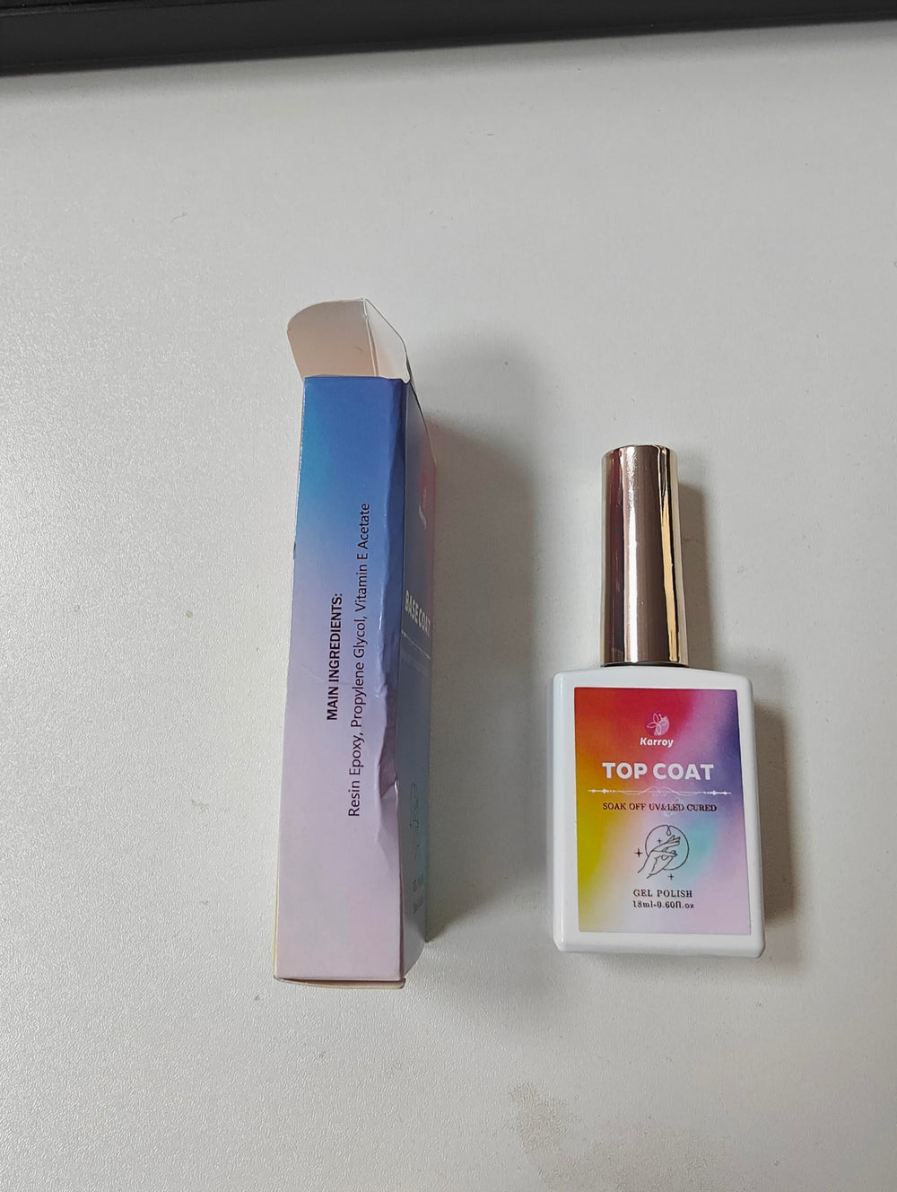 Karroy top coat packaging beside UV/LED lamp indicating lamp-cured convenience