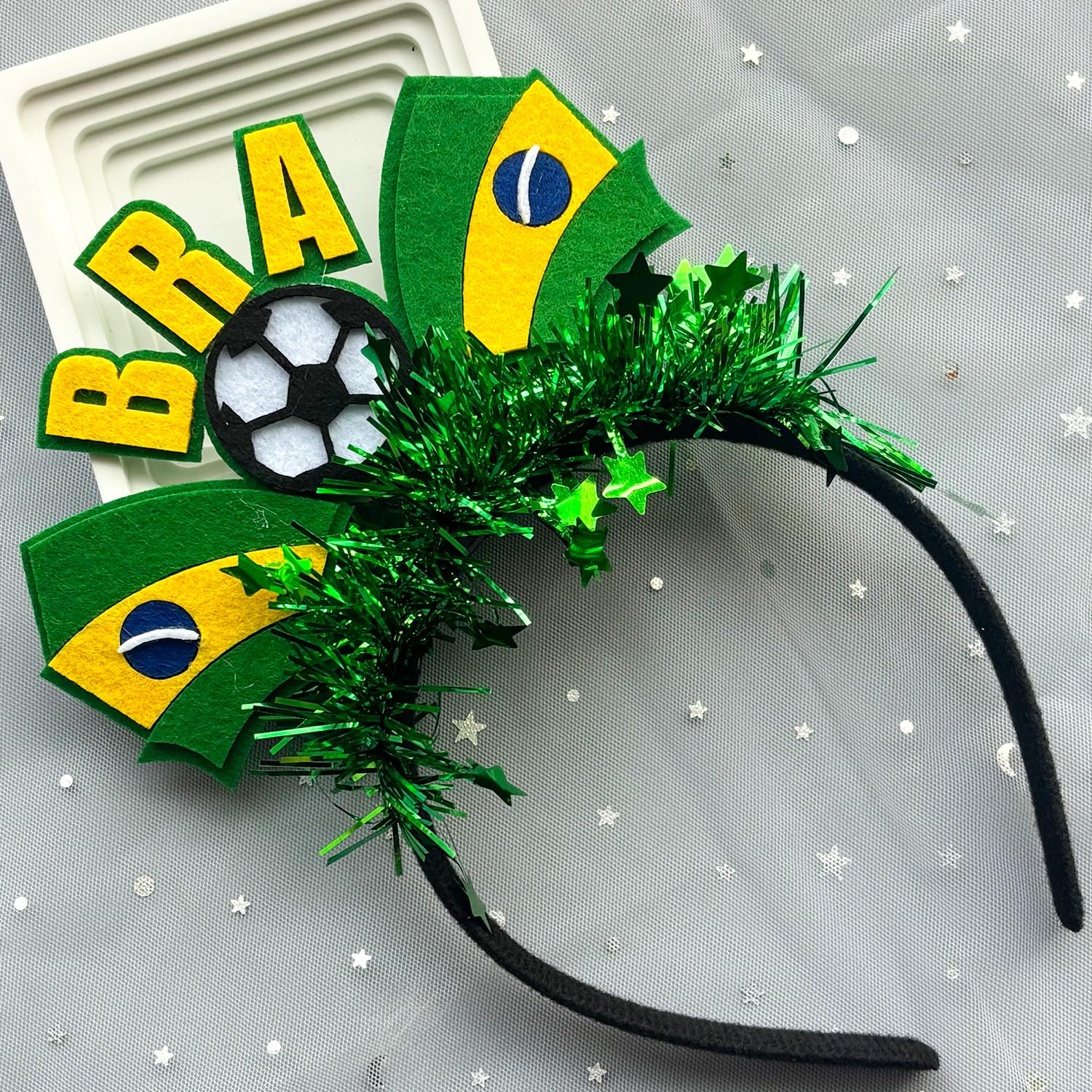 KASOICRA headband beside a hand to show scale and comfortable fit