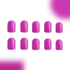 KASOICRA hand applying a press-on nail demonstrating easy glue-on application and quick styling benefit