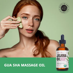Kate Blanc applying jojoba oil to hair for smooth shine