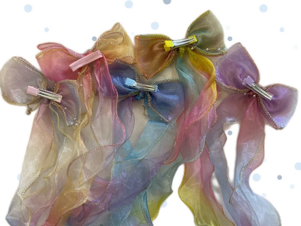 KaySJbay bow used on a ponytail showing flowing long tails for movement