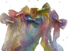 KaySJbay bow used on a ponytail showing flowing long tails for movement
