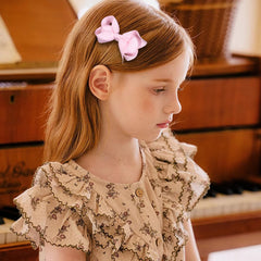 KCHIES alligator clip detail, highlighting sturdy grip and comfortable, secure hold benefit