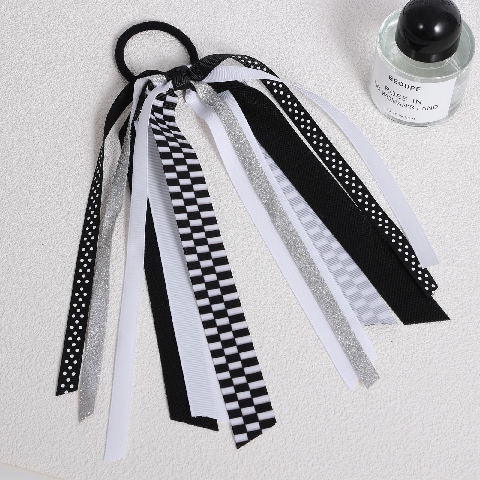 KCHIES close-up of glitter checkered bow highlighting durable decorative finish