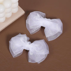 KCHIES close-up of organza and tulle texture highlighting lightweight delicate feel