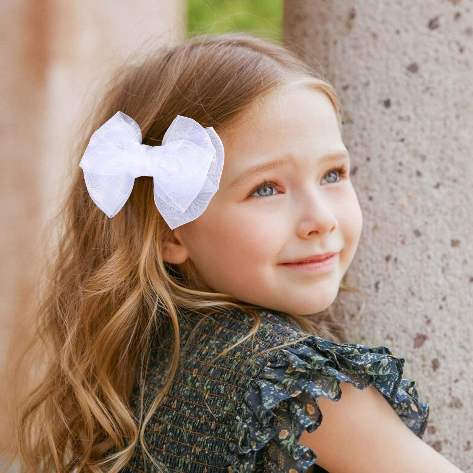 KCHIES bow clipped in ponytail showing instant style uplift for events