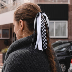 KCHIES model wearing high ponytail showcasing race-day stylish movement benefit