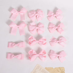 KCHIES bow beside ruler showing 3-inch size, helpful scale for choosing fit benefit