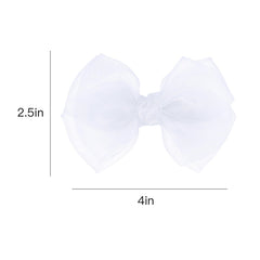 KCHIES bow styled with a dress showing bridal or pageant-ready coordination