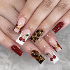 Kcjckcdd front packaging showing brown leopard and red cherry nails, perfect for gifting