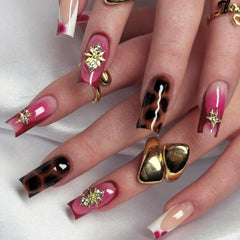 Kcjckcdd front packaging showing leopard pink press-on nails and included kit benefits