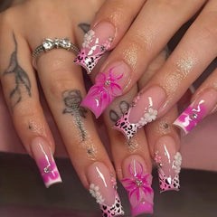 Kcjckcdd front packaging showing 24-piece pink floral and leopard press-on set for easy gifting