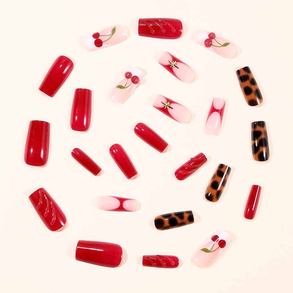 Kcjckcdd overview of leopard print and red accent nails demonstrating design variety