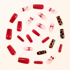 Kcjckcdd overview of leopard print and red accent nails demonstrating design variety